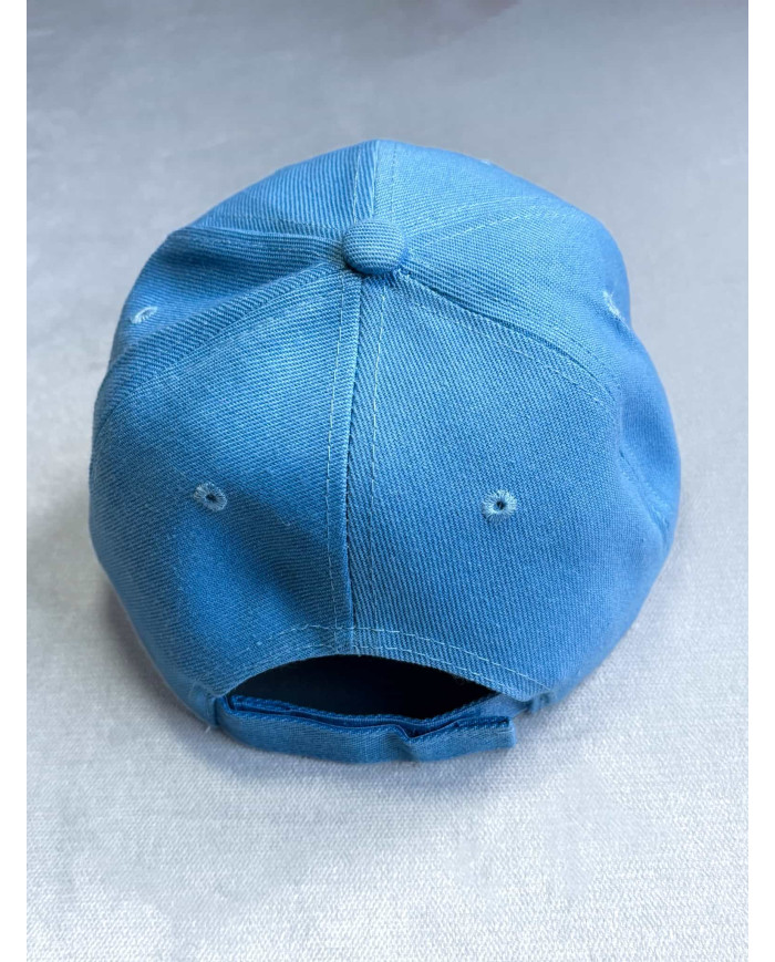 Gorra Baby blue ESTAMOS ROTOS Y LO ROTO NO SE DAÑA